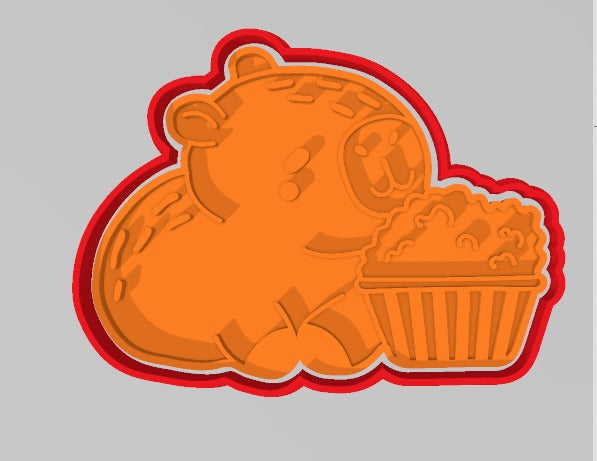 Capibara con palomitas